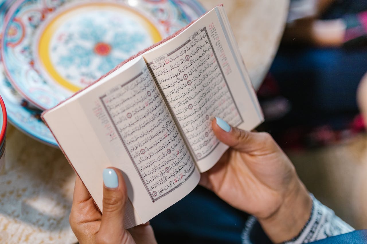 Person Reading And Praying